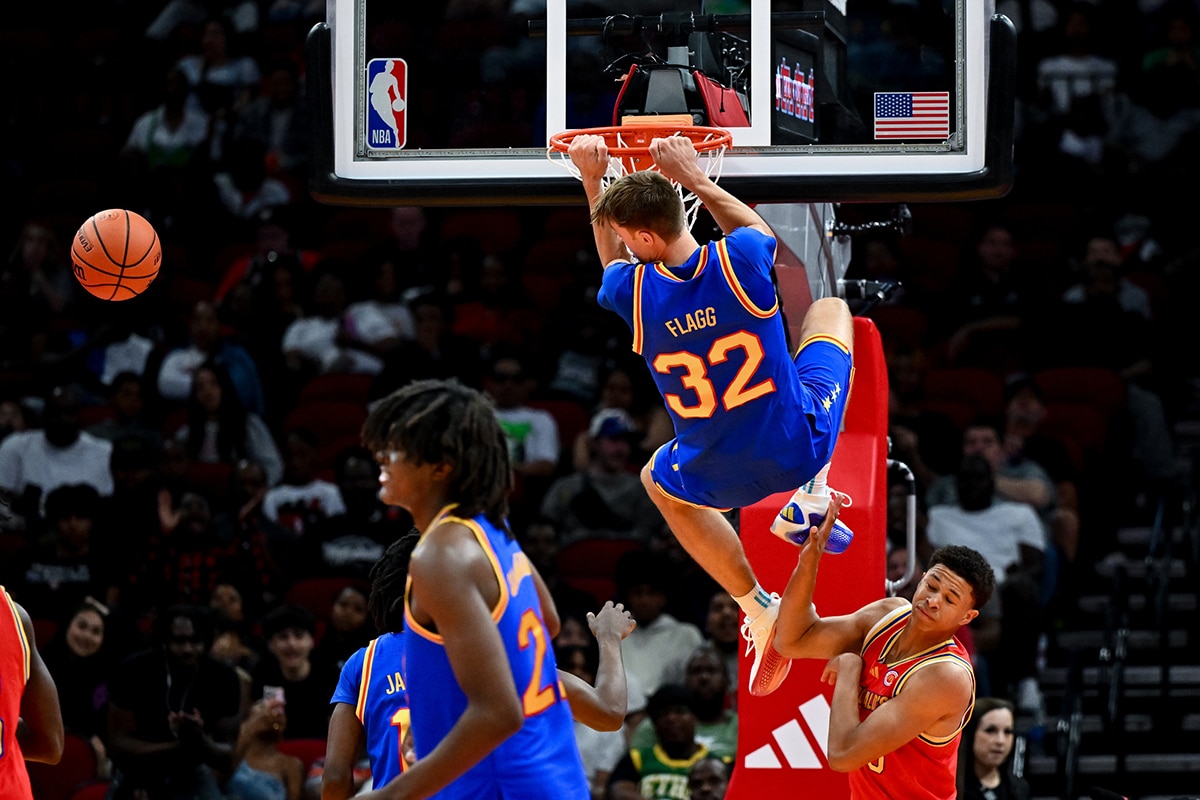 McDonald's All American East forward Cooper Flagg (32) dunks the ball during the second half against the McDonald's All American East at Toyota Center.
