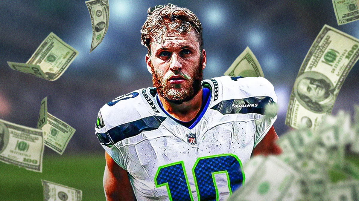 Seattle Seahawks receiver Cooper Kupp surrounded by piles of cash.