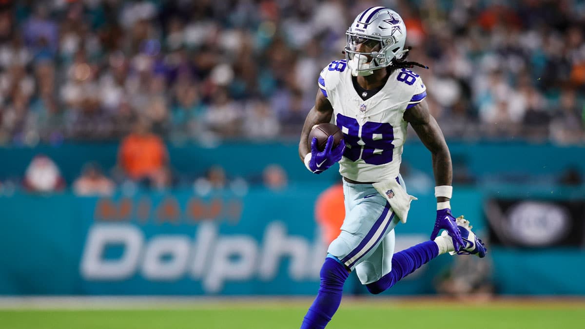 Dallas Cowboys wide receiver CeeDee Lamb (88) runs with the football against the Miami Dolphins during the fourth quarter at Hard Rock Stadium.