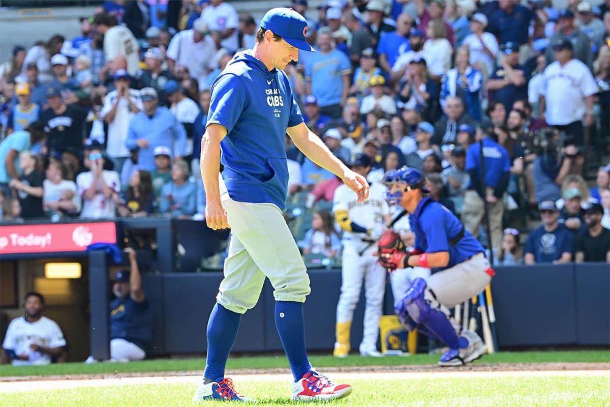 Chicago Cubs manager Craig Counsell walks back to the dugout after making a pitching change in the fourth inning against the Milwaukee Brewers at American Family Field.