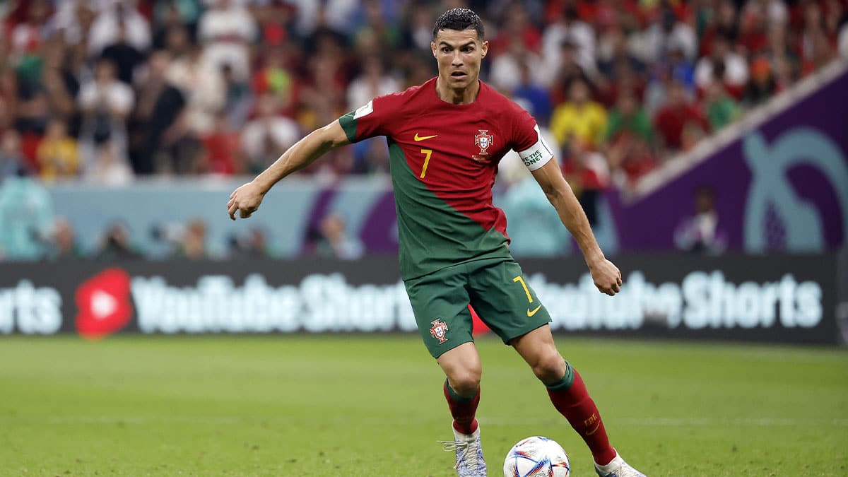 Portugal forward Cristiano Ronaldo (7) moves the ball against Uruguay during the second half of the group stage match in the 2022 World Cup at Lusail Stadium. 