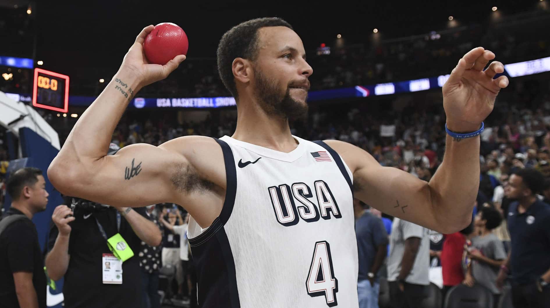 USA guard Steph Curry (4) throws a ball to the fans after defeating Canada in the USA Basketball Showcase at T-Mobile Arena