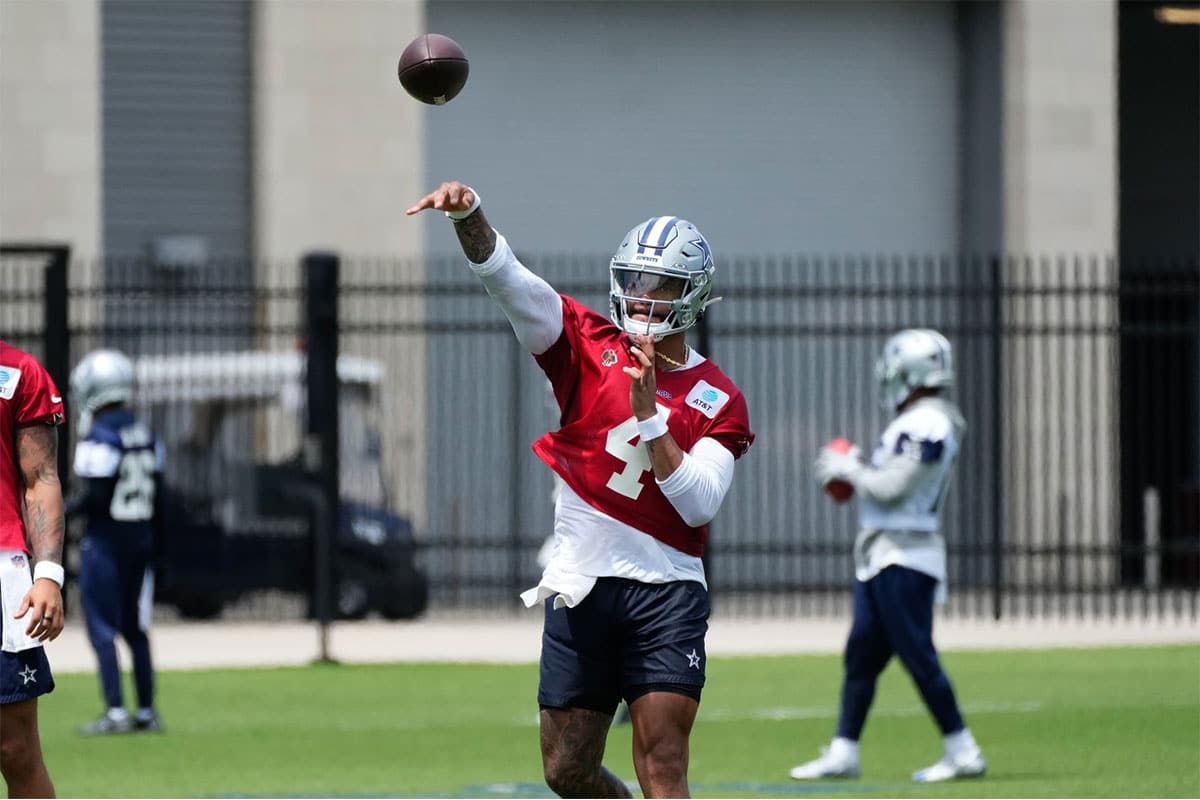 allas Cowboys quarterback Dak Prescott (4) goes through a drill during practice at the Ford Center at the Star Training Facility in Frisco, Texas.