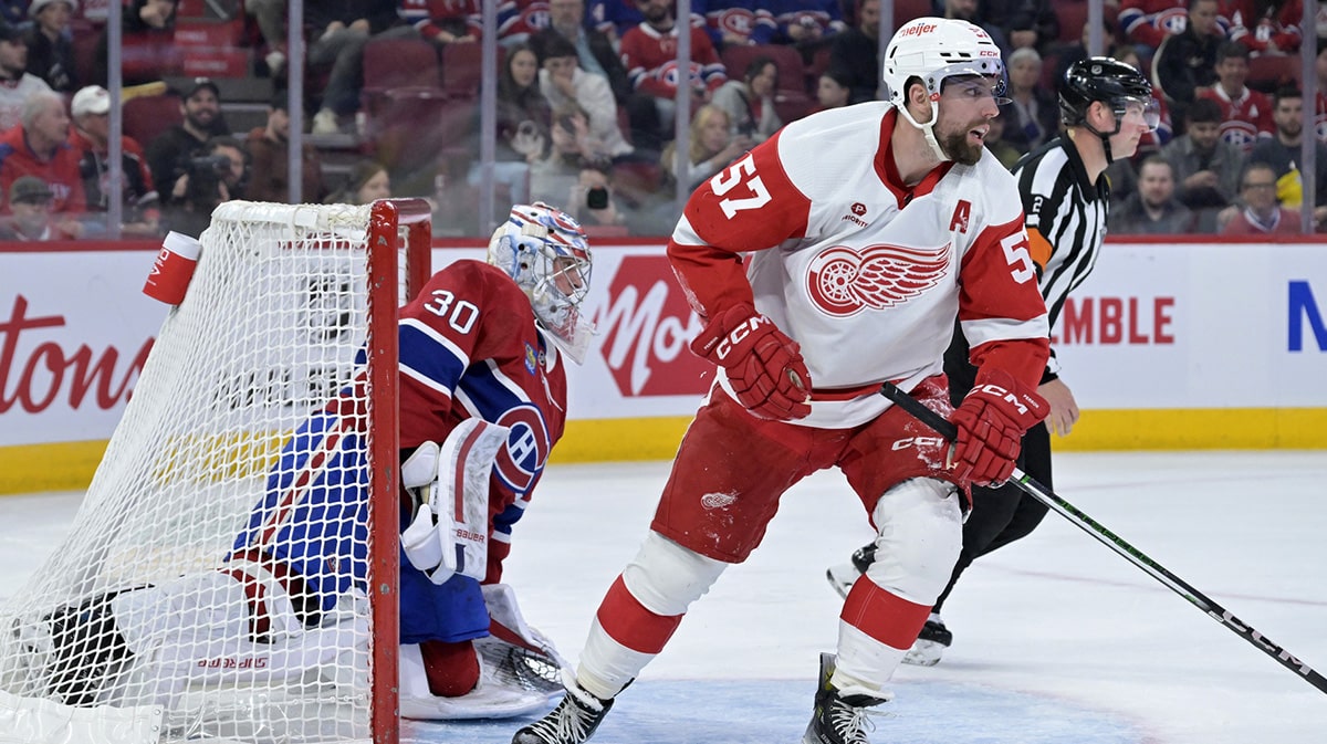 Detroit Red Wings forward David Perron (57) and Montreal Canadiens goalie Cayden Primeau (30) during the third period at the Bell Centre.