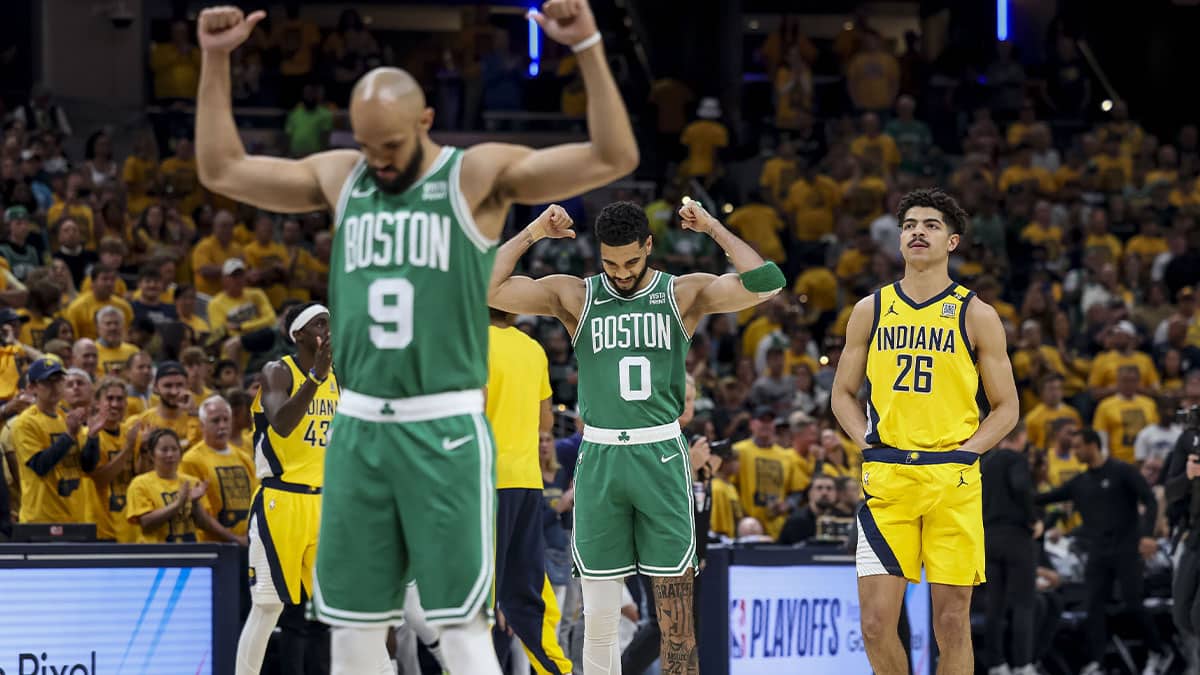 Boston Celtics guard Derrick White (9) and Boston Celtics forward Jayson Tatum (0) react