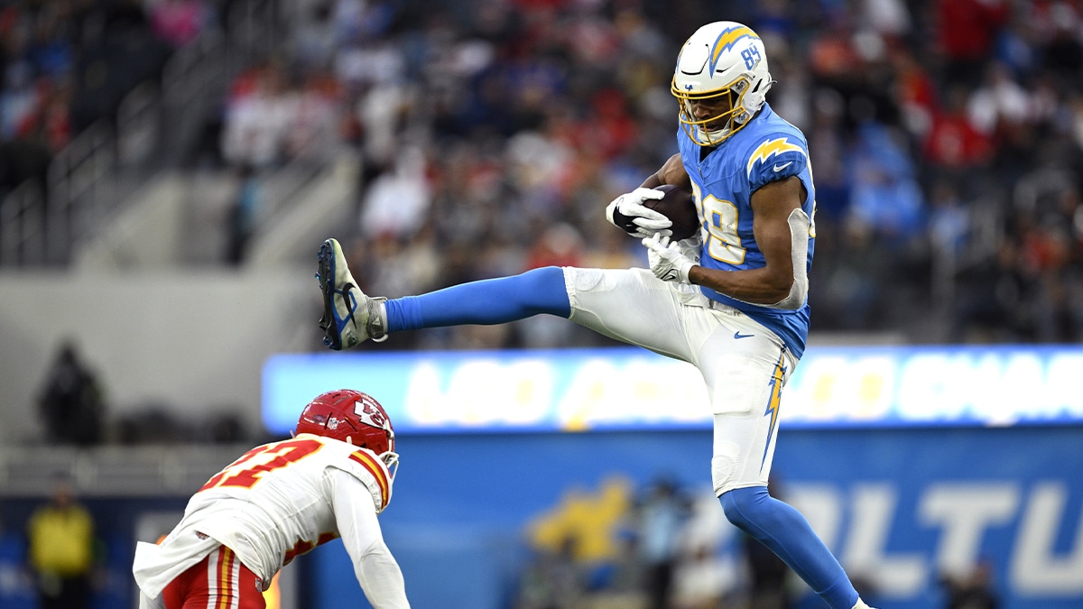 Los Angeles Chargers tight end Donald Parham Jr. (89) makes a catch over Kansas City Chiefs safety Chamarri Conner (27) during the second half at SoFi Stadium.