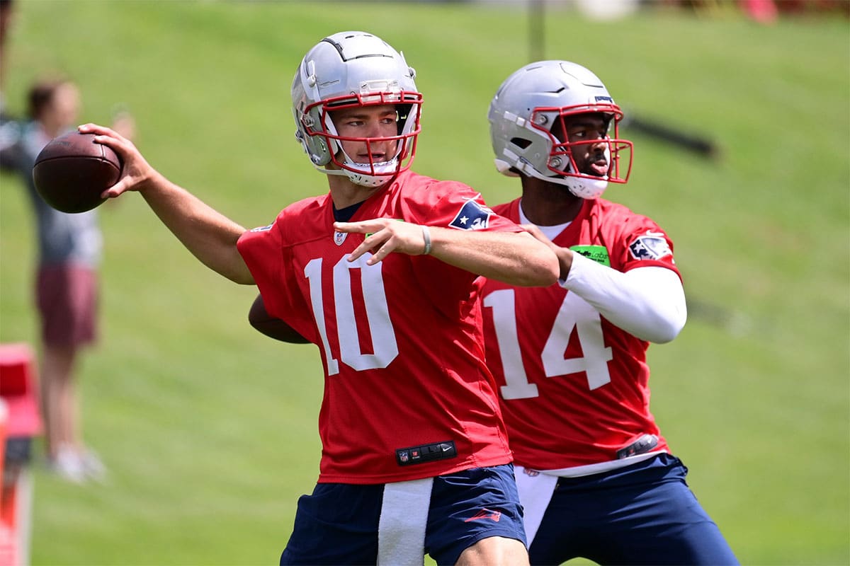 New England Patriots quarterback Drake Maye (10) and quarterback Jacoby Brissett (14) throw passes at minicamp at Gillette Stadium.