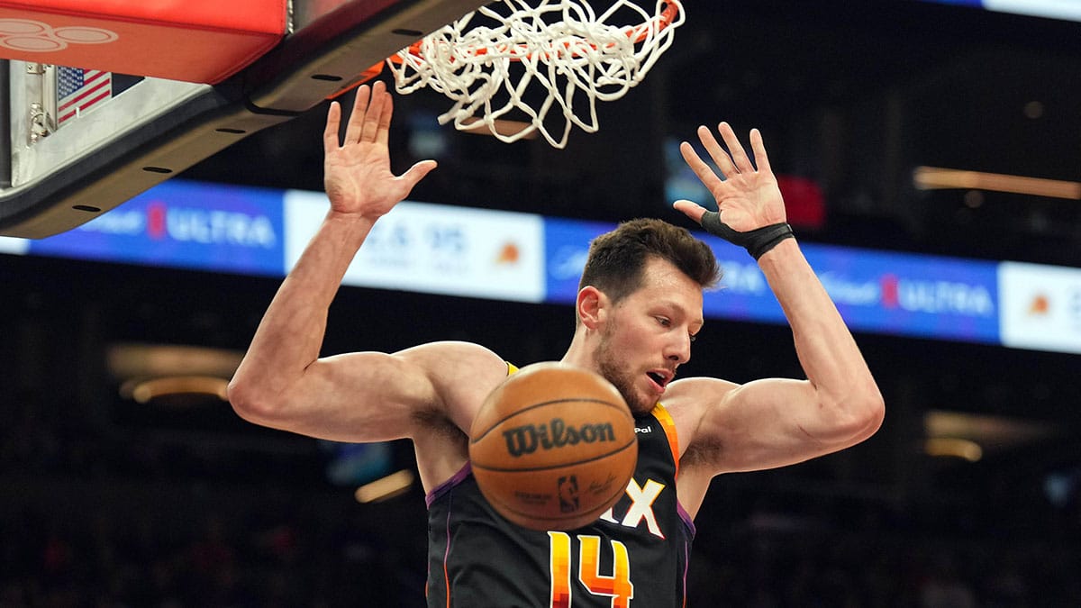Phoenix Suns forward Drew Eubanks (14) dunks against the Minnesota Timberwolves during the second half of game three of the first round for the 2024 NBA playoffs at Footprint Center.