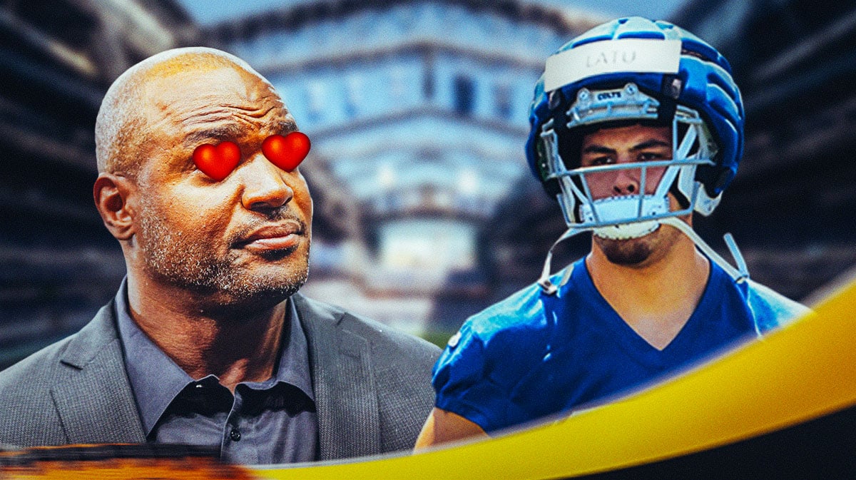 Dwight Freeney with heart eyes looking at Laiatu Latu in Colts gear