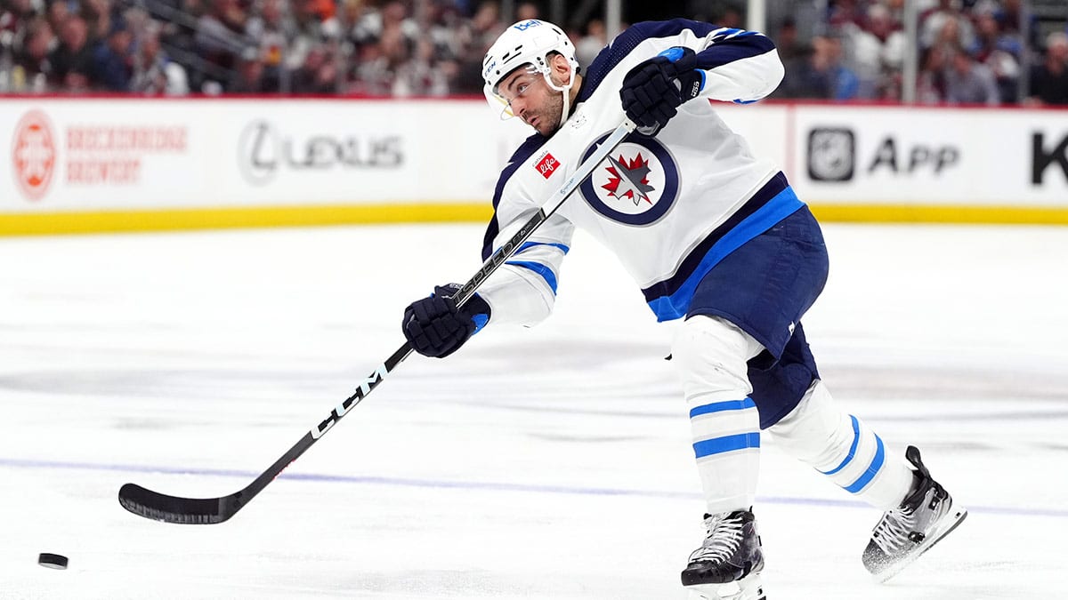Winnipeg Jets defenseman Dylan DeMelo (2) shoots the puck during the third period against the Colorado Avalanche in game four of the first round of the 2024 Stanley Cup Playoffs at Ball Arena.