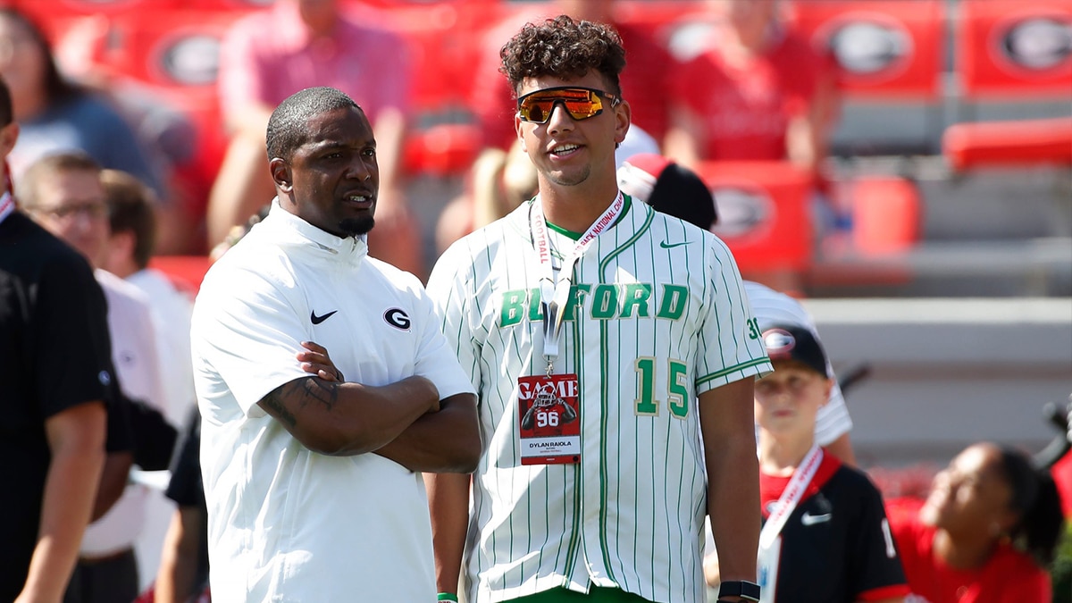 Buford quarterback and Georgia commit Dylan Raiola looks on from the sideline during warm ups before the start of a NCAA college football game against Ball State