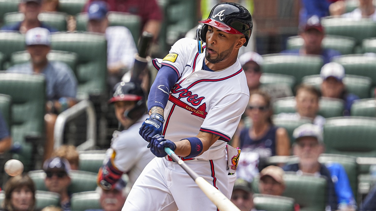 Atlanta Braves left fielder Eddie Rosario (8) hits a two run game tying home run against the St. Louis Cardinals during the seventh inning at Truist Park.
