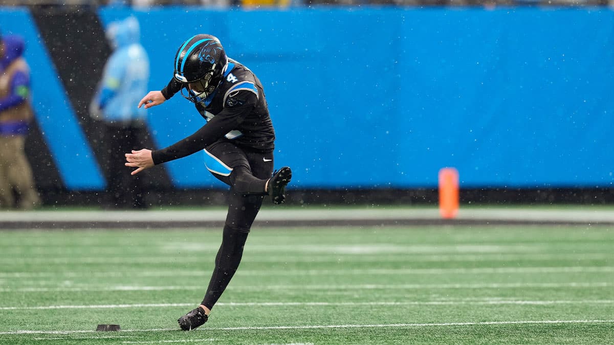 Carolina Panthers place kicker Eddy Pineiro (4) kicks off the first quarter against the Atlanta Falcons at Bank of America Stadium.