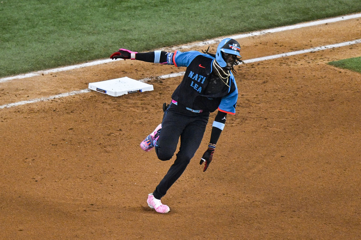 National League shortstop Elly De La Cruz of the Cincinnati Reds (44) hits a single against the American League during the seventh inning of the 2024 MLB All-Star game at Globe Life Field.