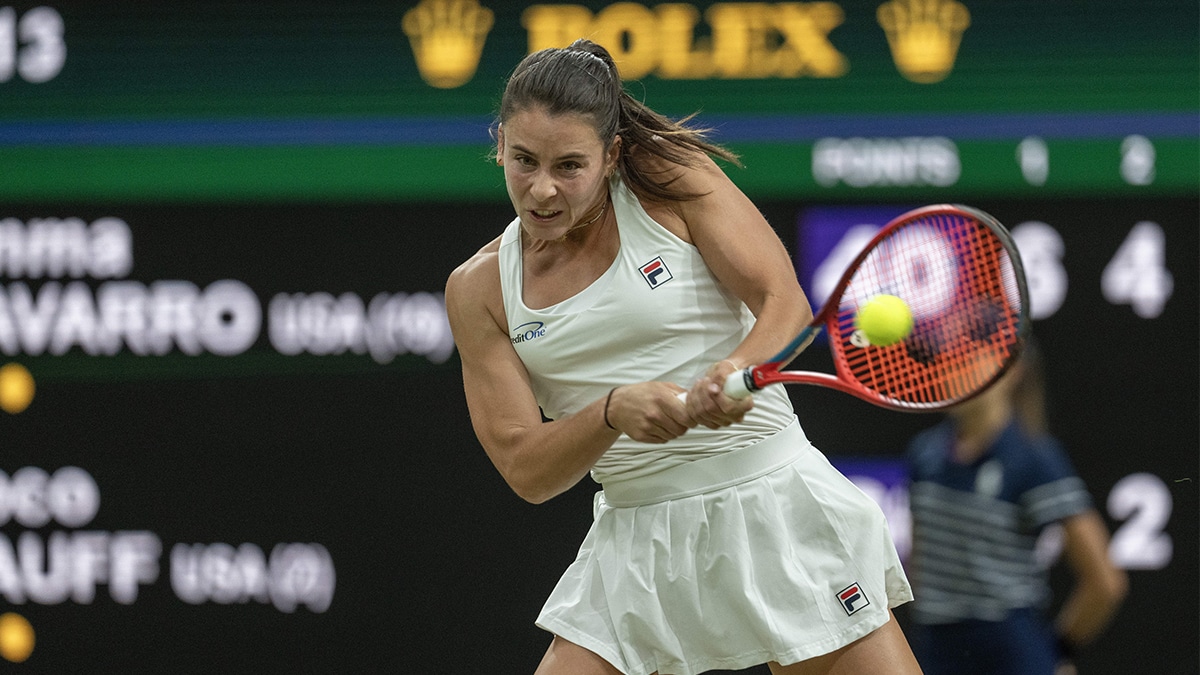 ; Emma Navarro of the United States returns a shot during her match against Coco Gauff of the United States (not shown) on day seven of The Championships at All England Lawn Tennis and Croquet Club.