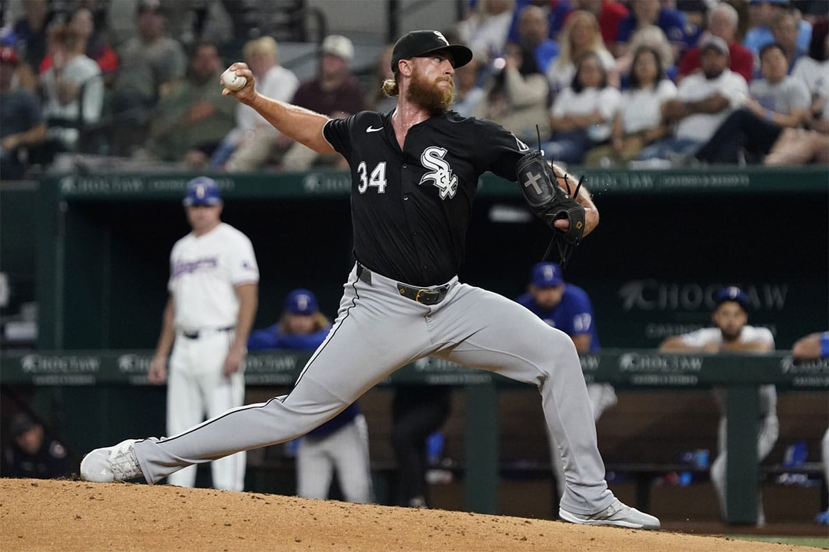 Chicago White Sox relief pitcher Michael Kopech (34) throws to the plate during the seventh inning against the Texas Rangers at Globe Life Field.