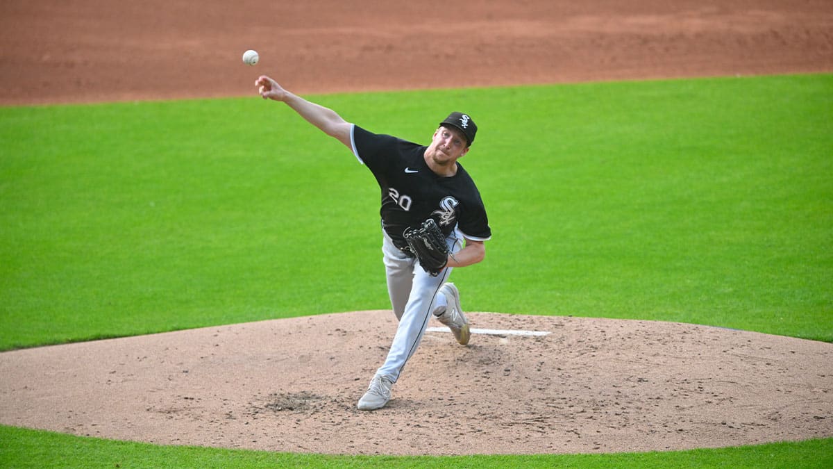 Jul 3, 2024; Cleveland, Ohio, USA; Chicago White Sox starting pitcher Erick Fedde (20) delivers a pitch in the second inning against the Cleveland Guardians at Progressive Field.