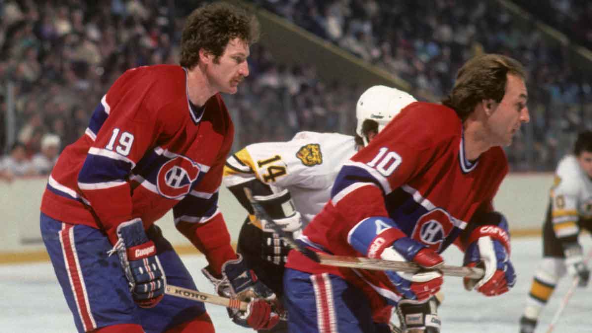 Montreal Canadiens right wing Guy Lafleur (10) and Larry Robinson (19) in action against the Boston Bruins during the 1982-83 season at the Boston Garden. 