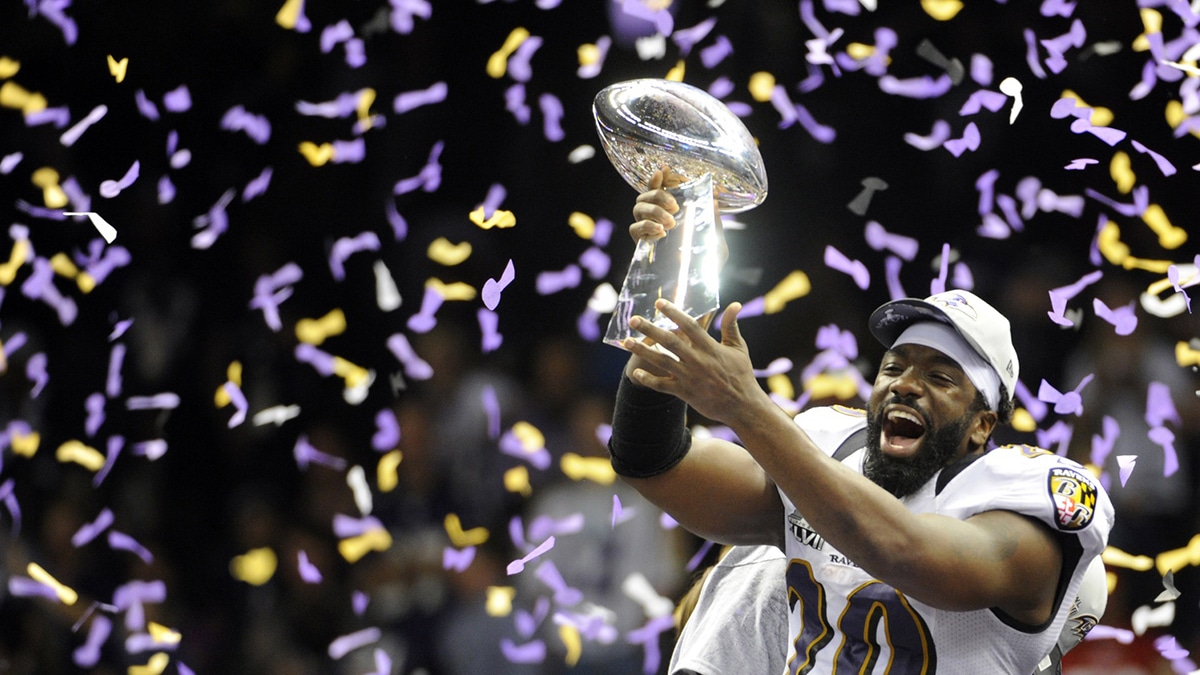 Baltimore Ravens free safety Ed Reed (20) celebrates with the Vince Lombardi Trophy after defeating the San Francisco 49ers in Super Bowl XLVII at the Mercedes-Benz Superdome. 