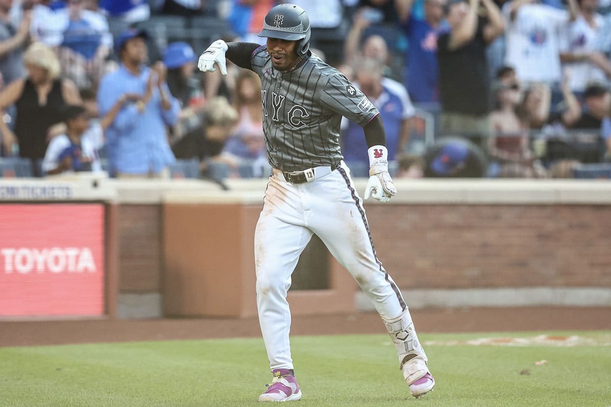 New York Mets shortstop Francisco Lindor (12) celebrates after hitting a three run home run in the eighth inning against the Colorado Rockies at Citi Field.