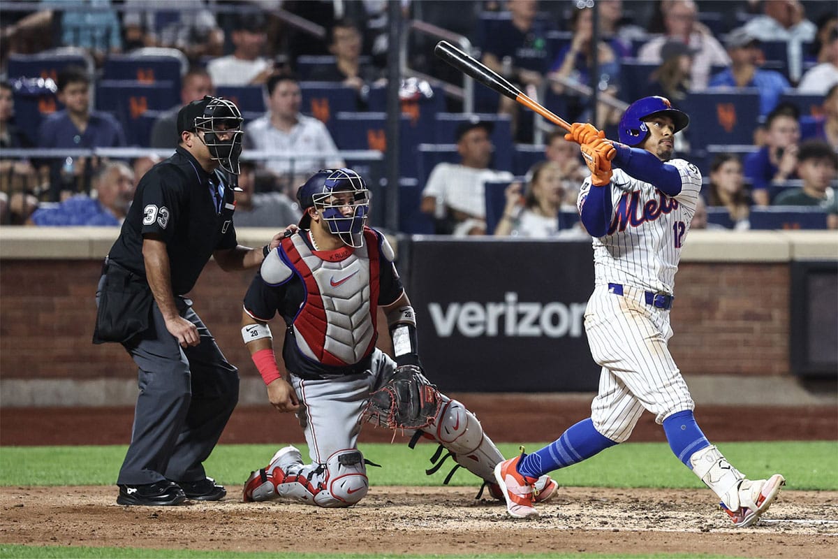 New York Mets shortstop Francisco Lindor (12) hits a two run home run in the sixth inning against the Washington Nationals at Citi Field.