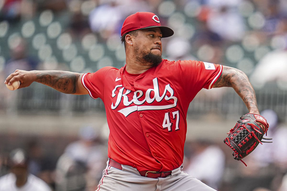 Cincinnati Reds starting pitcher Frankie Montas (47) pitches against the Atlanta Braves during the fifth inning at Truist Park. 