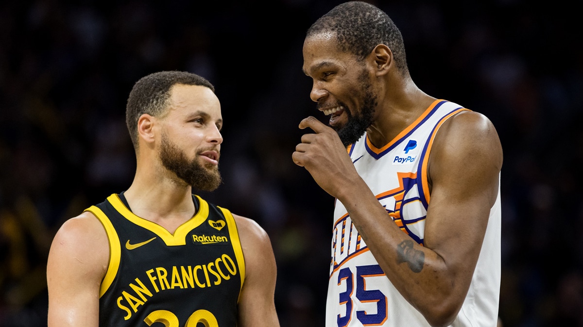 Feb 10, 2024; San Francisco, California, USA; Golden State Warriors guard Stephen Curry (30) and Phoenix Suns forward Kevin Durant (35) talk during the second half at Chase Center. Mandatory Credit: John Hefti-USA TODAY Sports