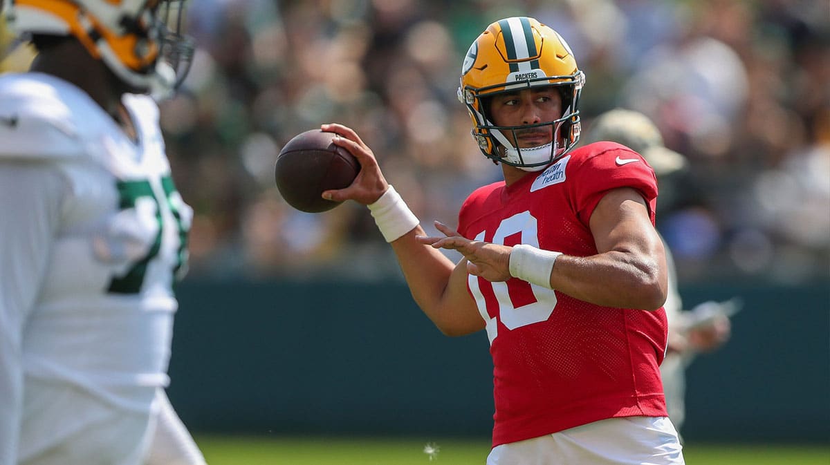 Green Bay Packers quarterback Jordan Love throws the ball in practice on Saturday, July 27, 2024, at Ray Nitschke Field in Ashwaubenon, Wis. Love signed a four-year, $220 million contract extension on Friday after sitting out of the first four team practices while his contract was being negotiated. 