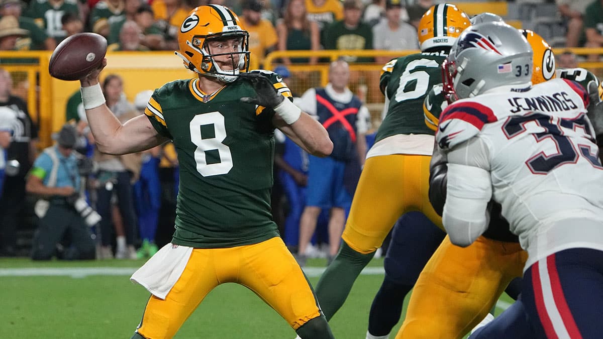 Green Bay Packers quarterback Sean Clifford (8) throws downfield during the second quarter of their preseason game against the New England Patriots Saturday, August 19, 2023 at Lambeau Field in Green Bay, Wis.