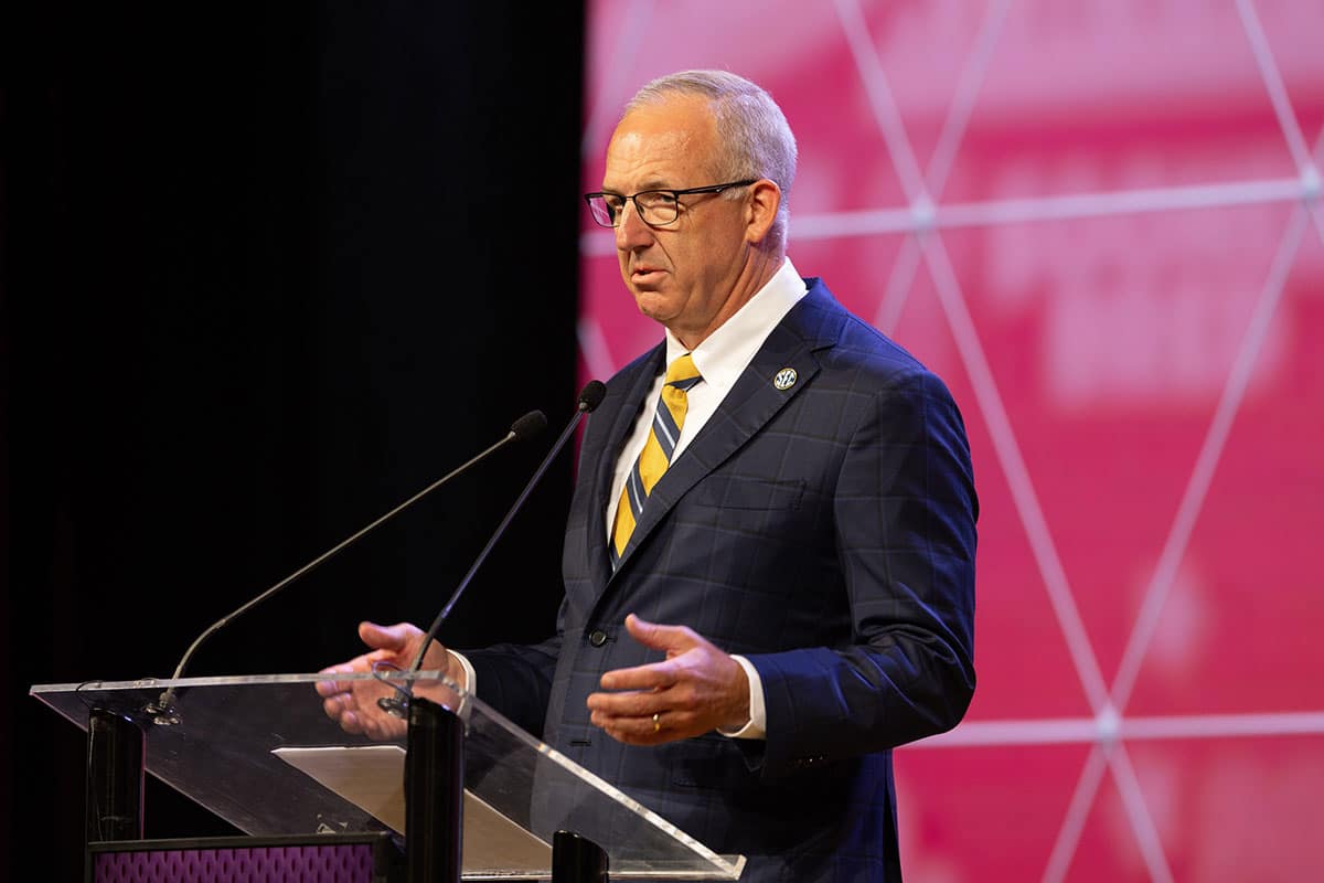 SEC commissioner Greg Sankey speaking at Omni Dallas Hotel.