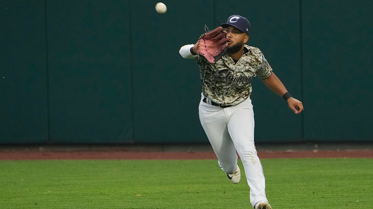 Columbus Clippers right fielder George Valera (13) catches a ball during the MiLB baseball game against the Toledo Mud Hens at Huntington Park.