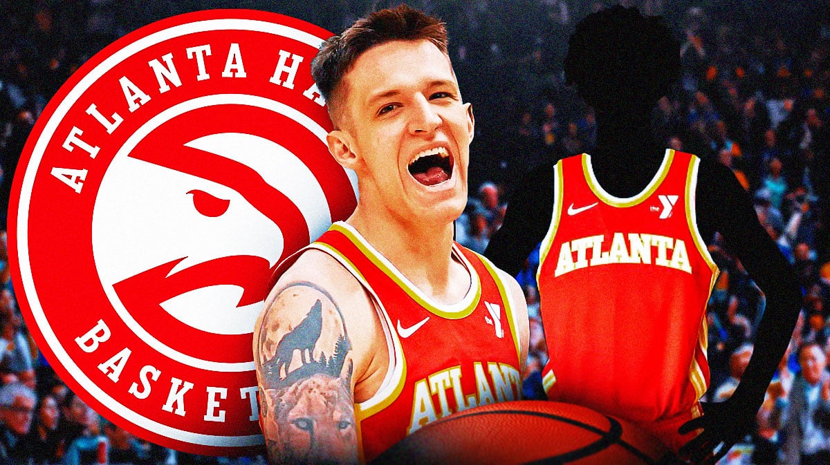 Vit Krejci in middle looking happy, one silhouetted Atlanta Hawks player, Atlanta Hawks logo, basketball court in background