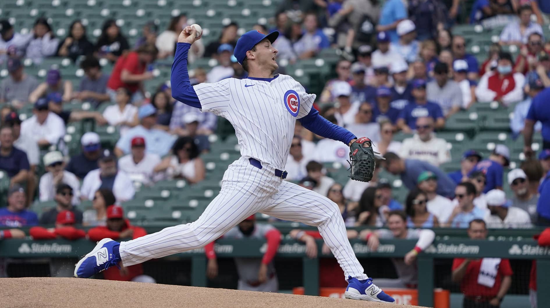 Chicago Cubs pitcher Hayden Wesneski (19) throws the ball against the Los Angeles Angels during the first inning at Wrigley Field. 