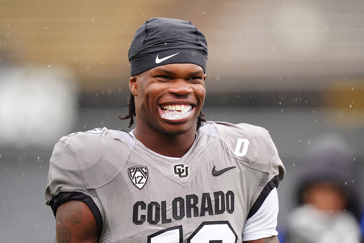 Colorado Buffaloes cornerback Travis Hunter (12) warms up before a spring game event at Folsom Field. 