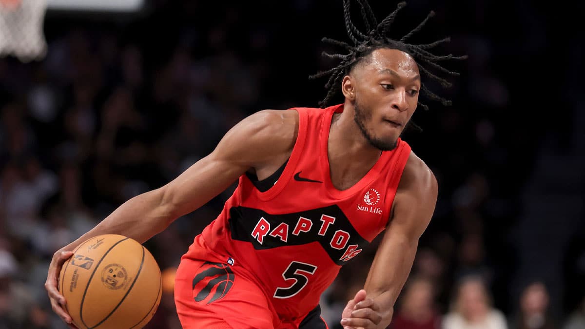 Toronto Raptors guard Immanuel Quickley (5) handles the ball against the Brooklyn Nets during the fourth quarter at Barclays Center.