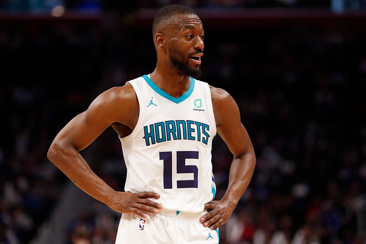 Charlotte Hornets guard Kemba Walker (15) talks to his bench during the fourth quarter against the Detroit Pistons at Little Caesars Arena.