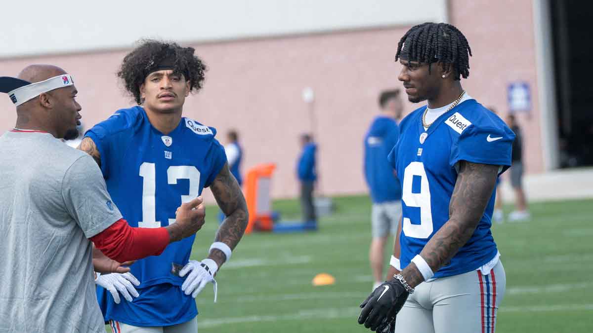 Right, Steve Smith, a former pro bowl NFL wide receiver, works with wide receivers Jalin Hyatt and Malik Nabers. The NY Giants NFL team held an organized team activity at their training facility