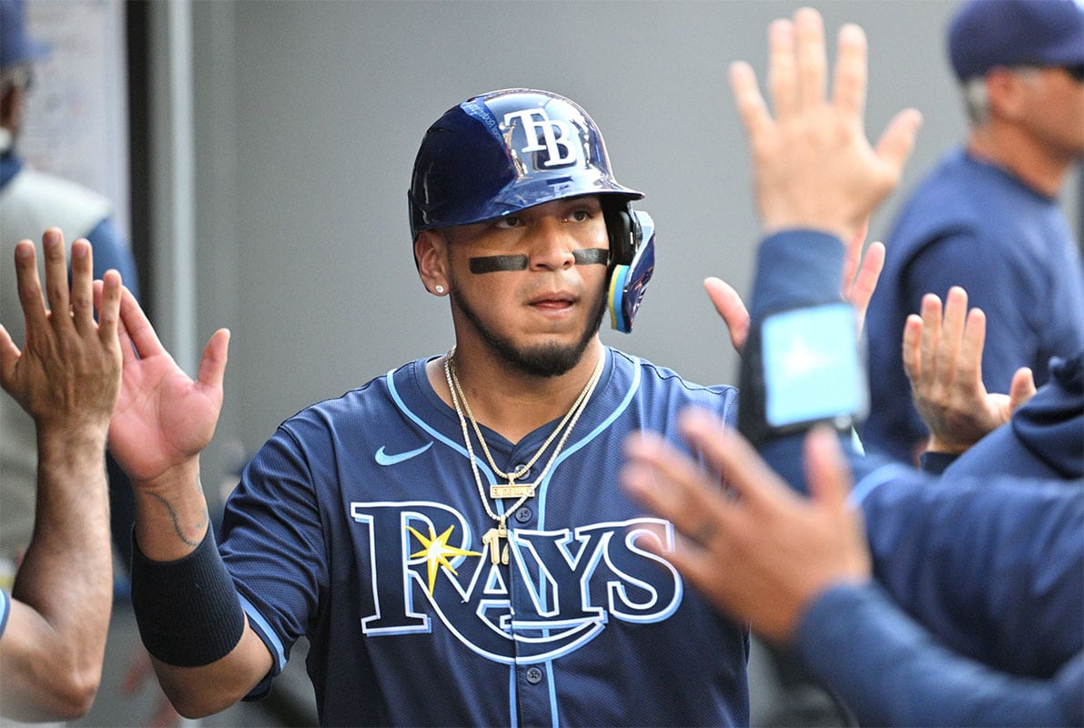 Tampa Bay Rays first baseman Isaac Paredes (17) celebrates in the dugout with teammates after scoring a run against the Toronto Blue Jays in the seventh inning at Rogers Centre.