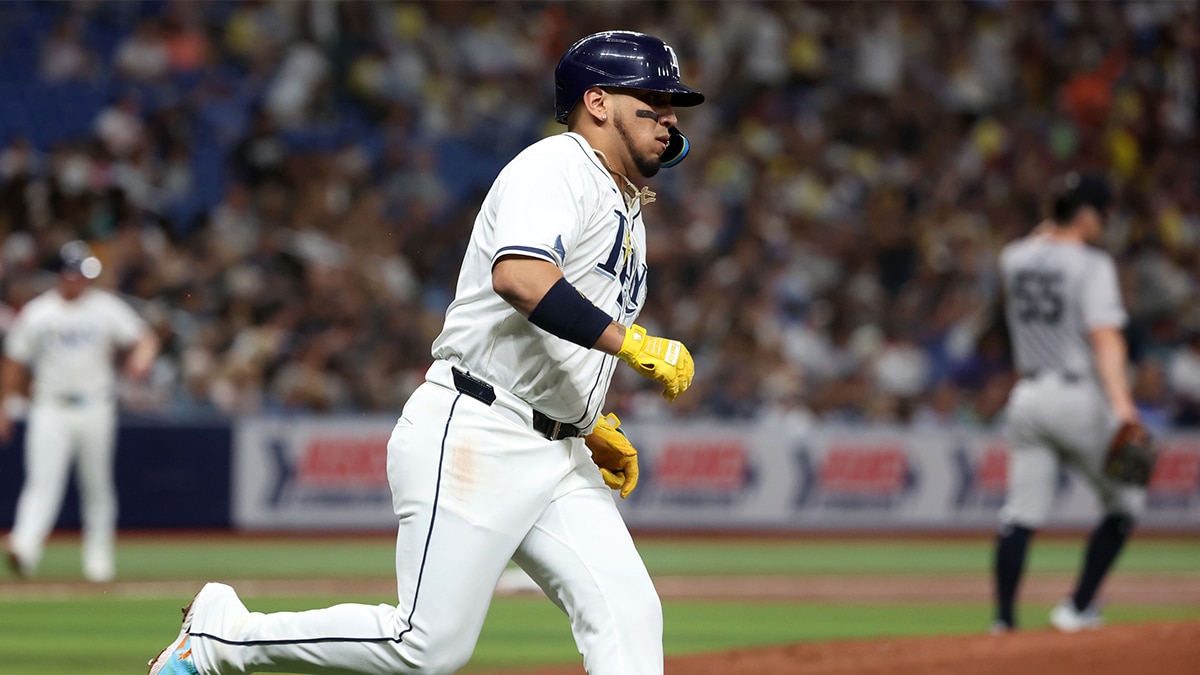 Tampa Bay Rays third base Isaac Paredes (17) hits a threenrun home run against the New York Yankees during the first inning at Tropicana Field.