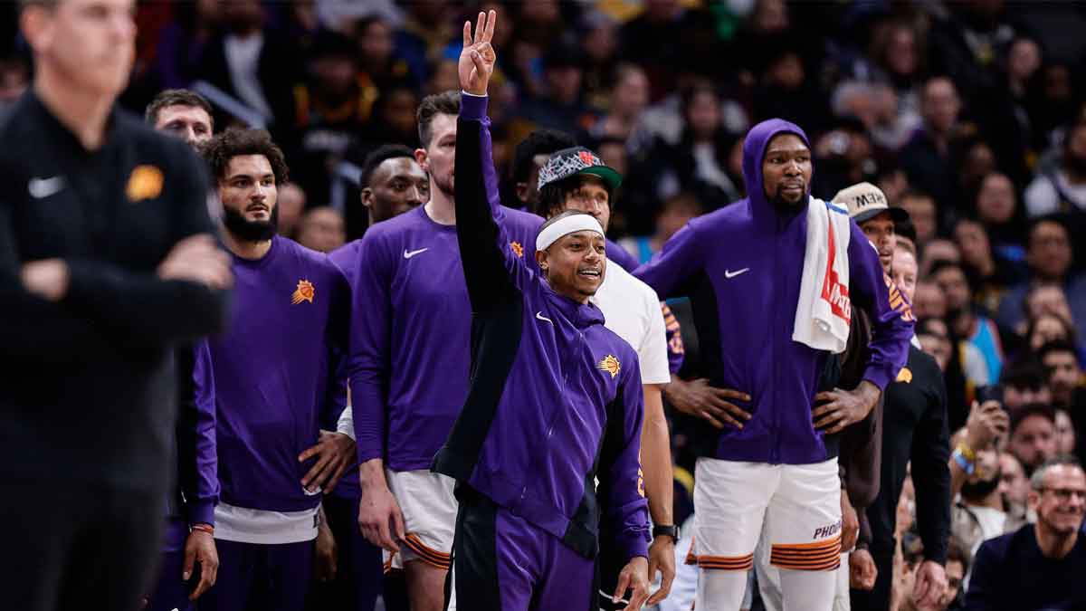 Phoenix Suns guard Isaiah Thomas (4) gestures from the bench
