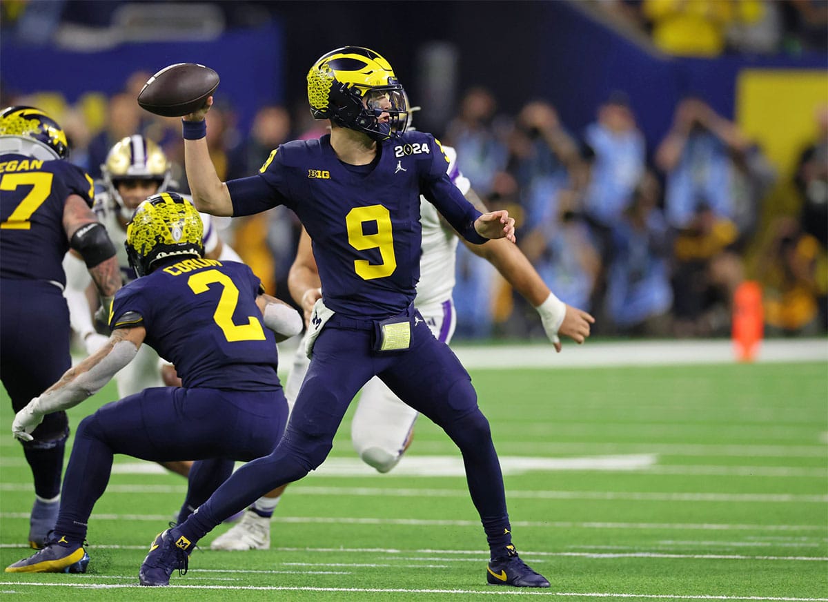  Michigan Wolverines quarterback J.J. McCarthy (9) passes the ball against the Washington Huskies during the third quarter in the 2024 College Football Playoff national championship game at NRG Stadium.