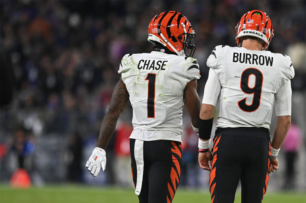 Cincinnati Bengals wide receiver Ja'Marr Chase (1) speaks with quarterback Joe Burrow (9) during the game against the Baltimore Ravens at M&T Bank Stadium.