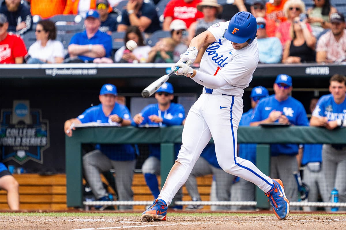 Florida Gators first baseman Jac Caglianone (14) hits a home run against the Kentucky Wildcats during the sixth inning at Charles Schwab Field Omaha. The 75th home run of his career, Caglianone breaks the Florida all-time home run record previously held by Matt LaPorta.