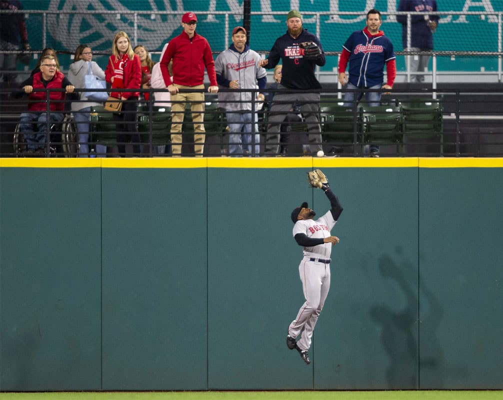 Sep 22, 2018; Cleveland, OH, USA; Boston Red Sox center fielder Jackie Bradley Jr. (19) makes a catch for the first out on a hit by Cleveland Indians first baseman Yonder Alonso (17) during the sixth inning at Progressive Field. 