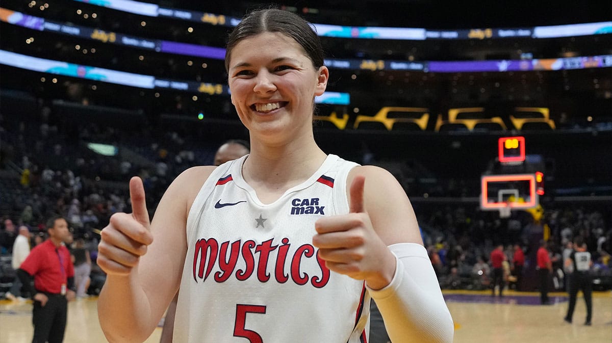 Washington Mystics guard Jade Melbourne (5) celebrates at the end of the game against the LA Sparks.