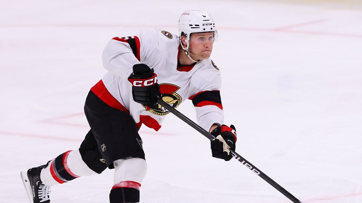 Ottawa Senators defenseman Jakob Chychrun (6) moves the puck against the Florida Panthers during the third period at Amerant Bank Arena.