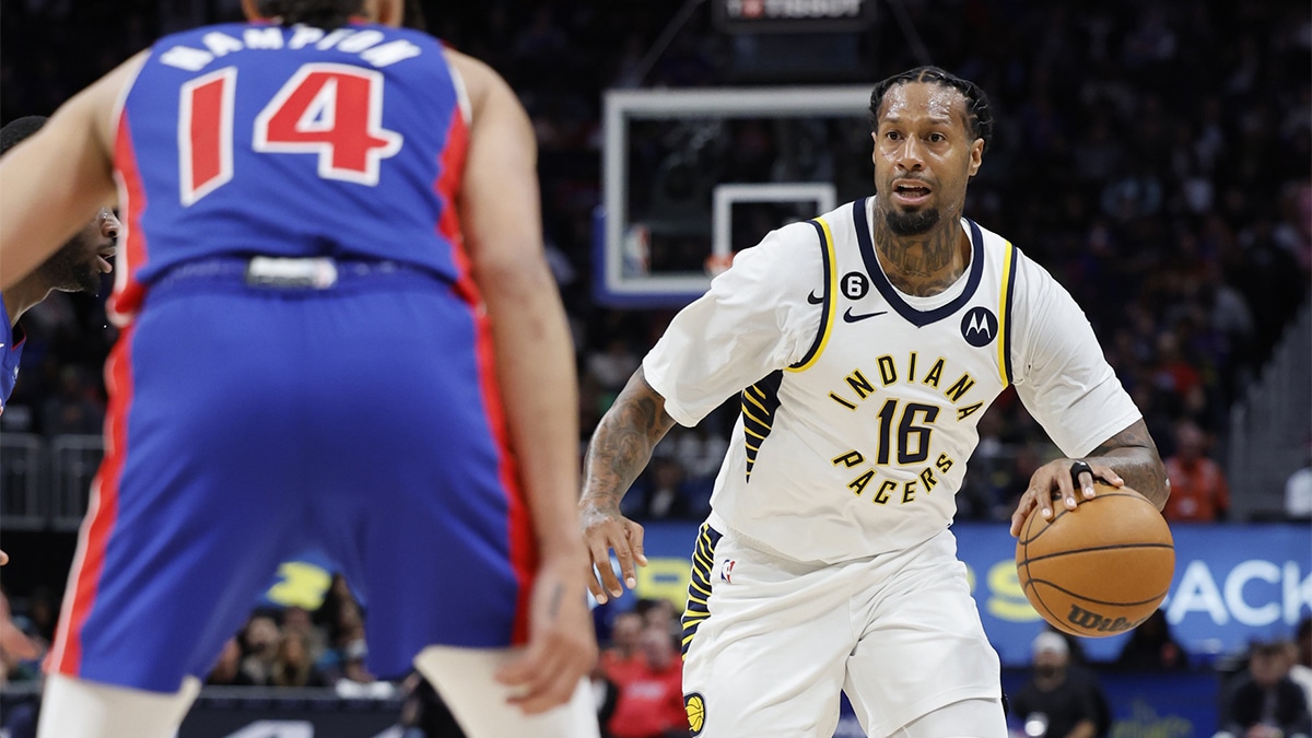 Indiana Pacers forward James Johnson (16) dribbles the ball against Detroit Pistons guard R.J. Hampton (14) in the second half at Little Caesars Arena.