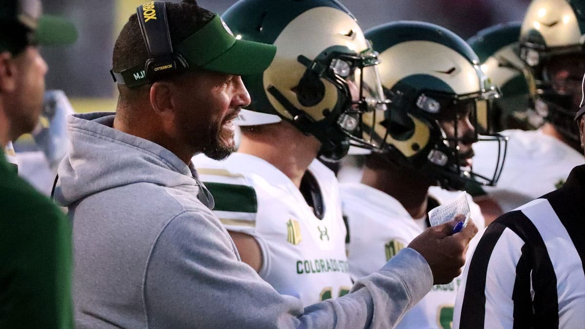 Colorado State head football coach Jay Norvell talks with players on the sidelines during MTSU's Homecoming football game against MTSU