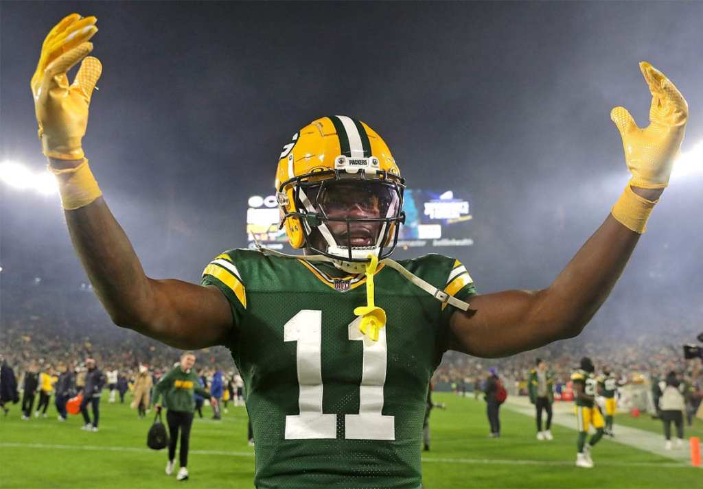 Green Bay Packers wide receiver Jayden Reed (11) celebrates the Packers victory over the Chicago Bears during their football game Sunday, January 7, 2024, at Lambeau Field in Green Bay, Wis. The Packers defeated the Bears 17-9.
