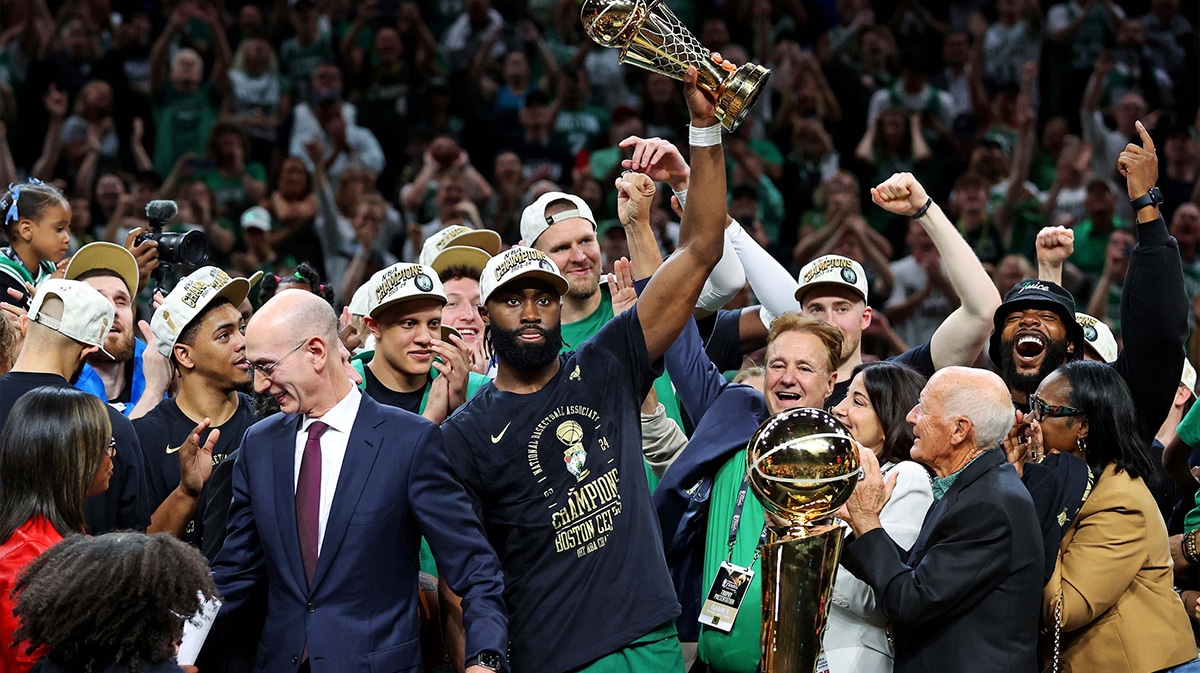 Boston Celtics guard Jaylen Brown (7) celebrates after winning the NBA Finals MVP after game five of the 2024 NBA Finals against the Dallas Mavericks at TD Garden.